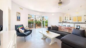 Living area - 2A, Cerritos, brand new condo steps from the ocean (El Pescadero)