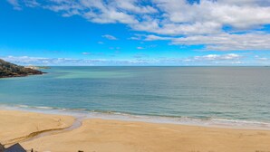 A beach with clear skies and calm waters. - Wavetop (St Ives)