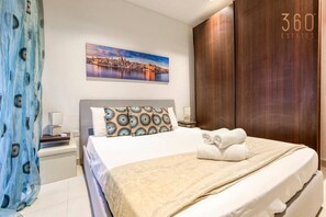 1 bedroom, desk, iron/ironing board, travel cot