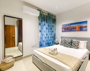 1 bedroom, desk, iron/ironing board, travel cot