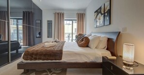 2 bedrooms, desk, iron/ironing board, travel cot