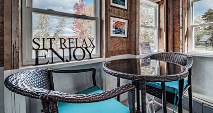 Our charming cottage and bunkhouse invites you to experience a lakeside getaway!