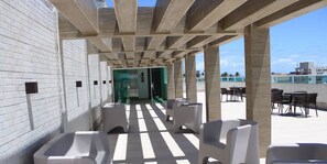 Apartamento | Restaurante al aire libre