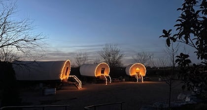 Stay in a unique Conestoga Wagon with room for 4