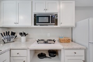 Fridge, microwave, coffee/tea maker, toaster