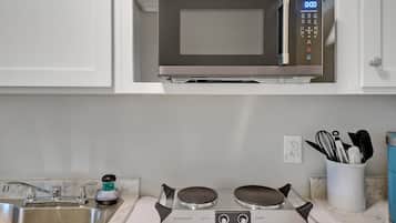 Fridge, microwave, coffee/tea maker, toaster