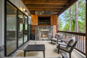 Terrace/patio - Discover Glamping at the Bomasion: Charming Cabin w/ Garage & Fenced Yard (Broken Bow)