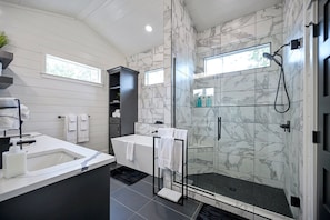 Shower, hair dryer, towels, shampoo
