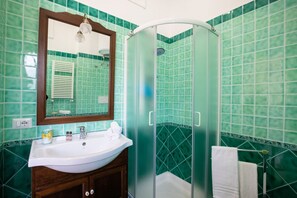 Shower, eco-friendly toiletries, hair dryer, bidet
