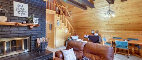 TV, fireplace, books, computer monitors