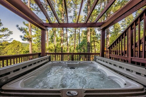 A playful cabin nestled above the tall pines