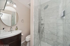 Shower, hair dryer, towels, soap
