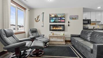 TV connectée, cheminée, jeux vidéo
