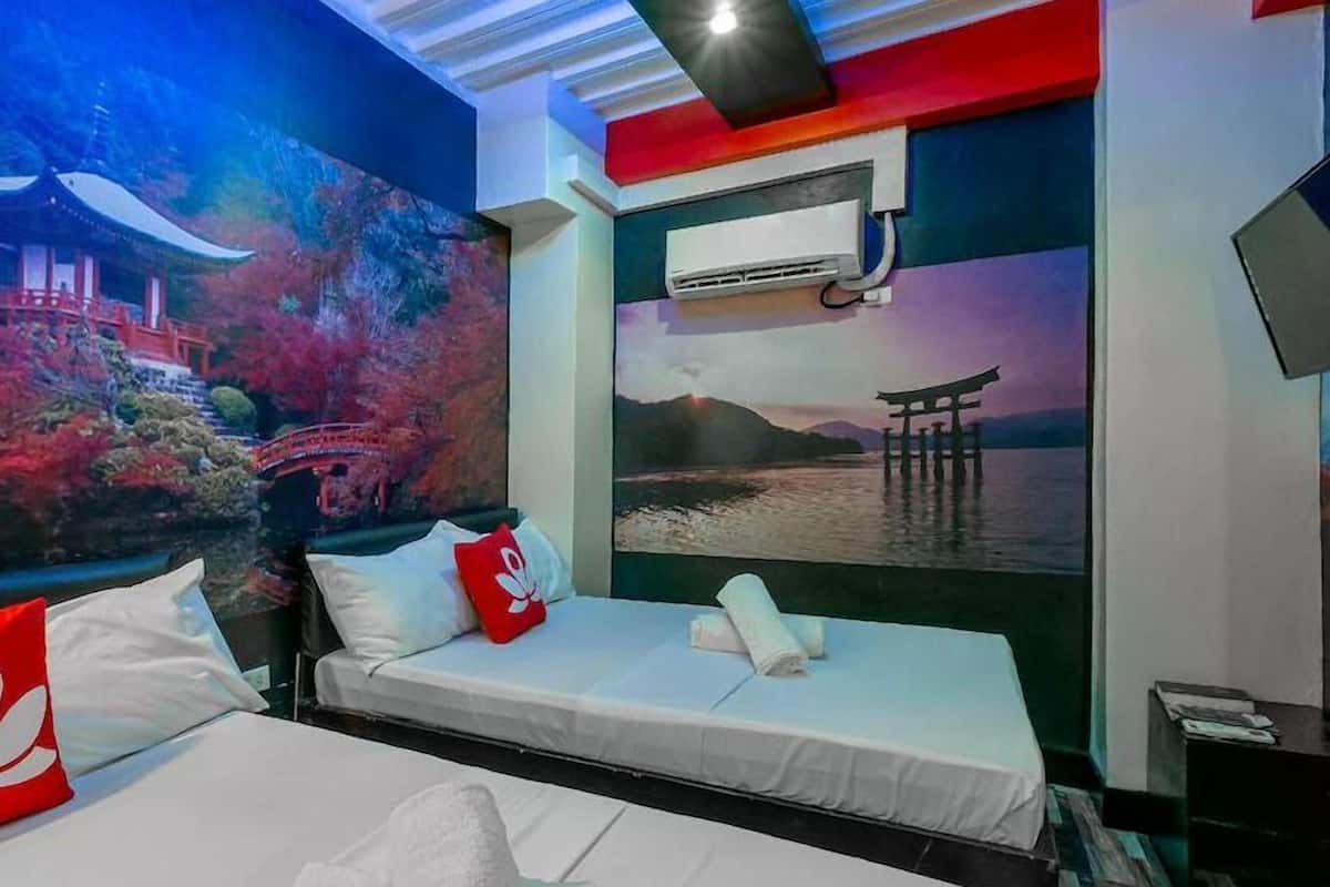 Premium-Vierbettzimmer | Zimmersafe, individuell dekoriert, individuell eingerichtet