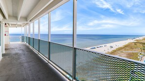 A balcony with a view of the beach and ocean. - FREE Beach Service!  Endless View 702 - New Listing (Panama City Beach)