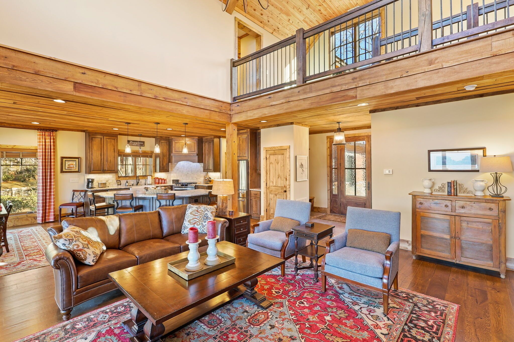 Cozy living room with ample seating in front of the fantastic fireplace. 