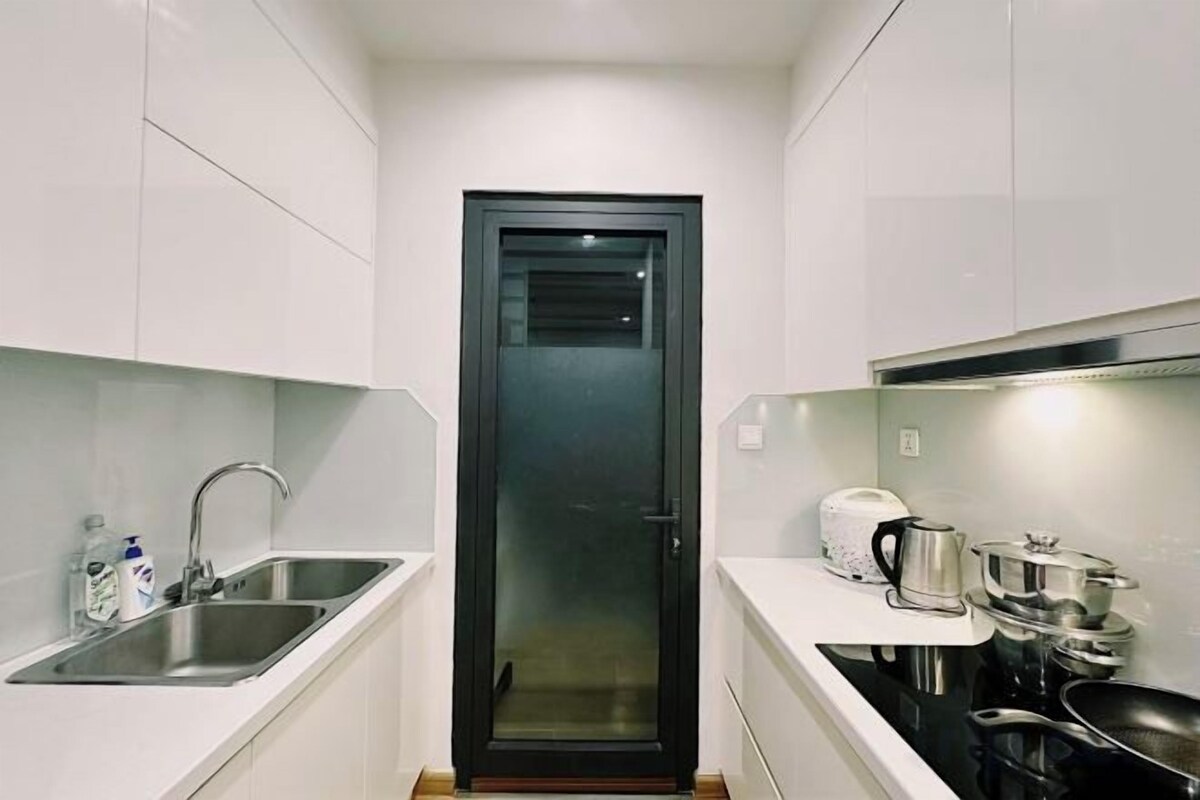 Cocina privada | Frigorífico, microondas, placa de cocina y arrocera