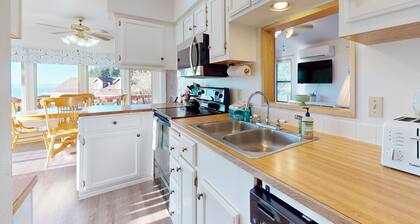Ocean view retreat with nautical interior, pinball machine, grill, games, & AC