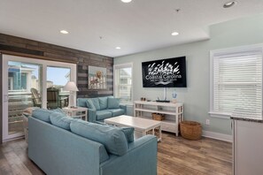 TV, fireplace - Currituck Cottage: Semi-Oceanfront, Private Hot Tub, Community Pool Access! (Nags Head)