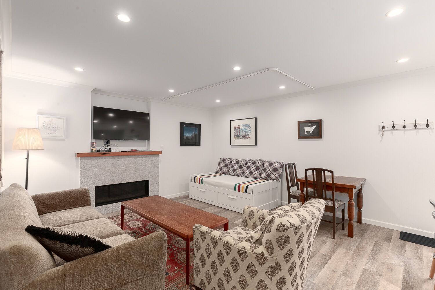 Smart TV, fireplace, books