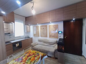 Flat-screen TV, video game console