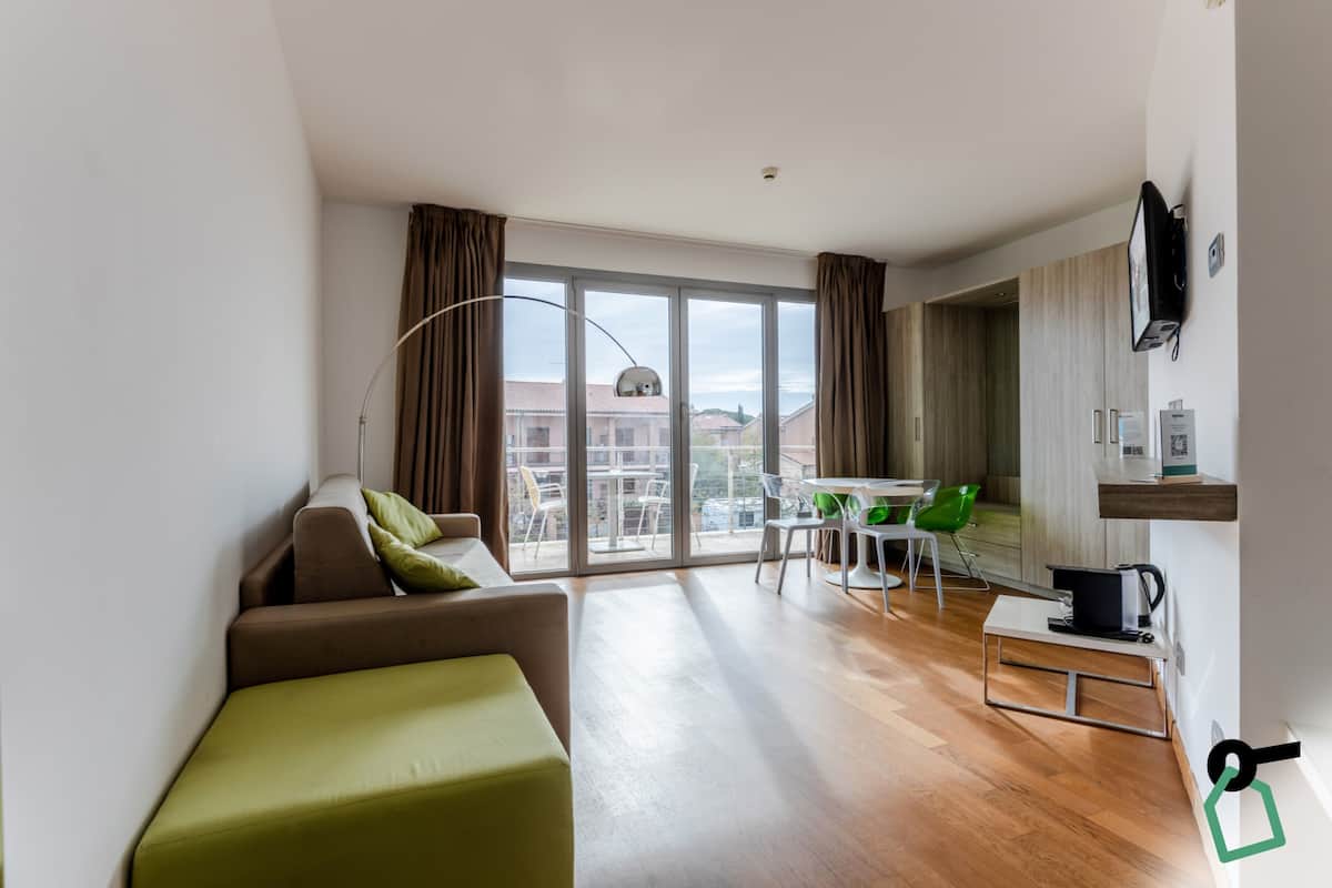 Standaard appartement | 1 slaapkamer, een minibar, een kluis op de kamer, een bureau