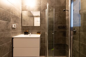 Hair dryer, towels, soap, shampoo
