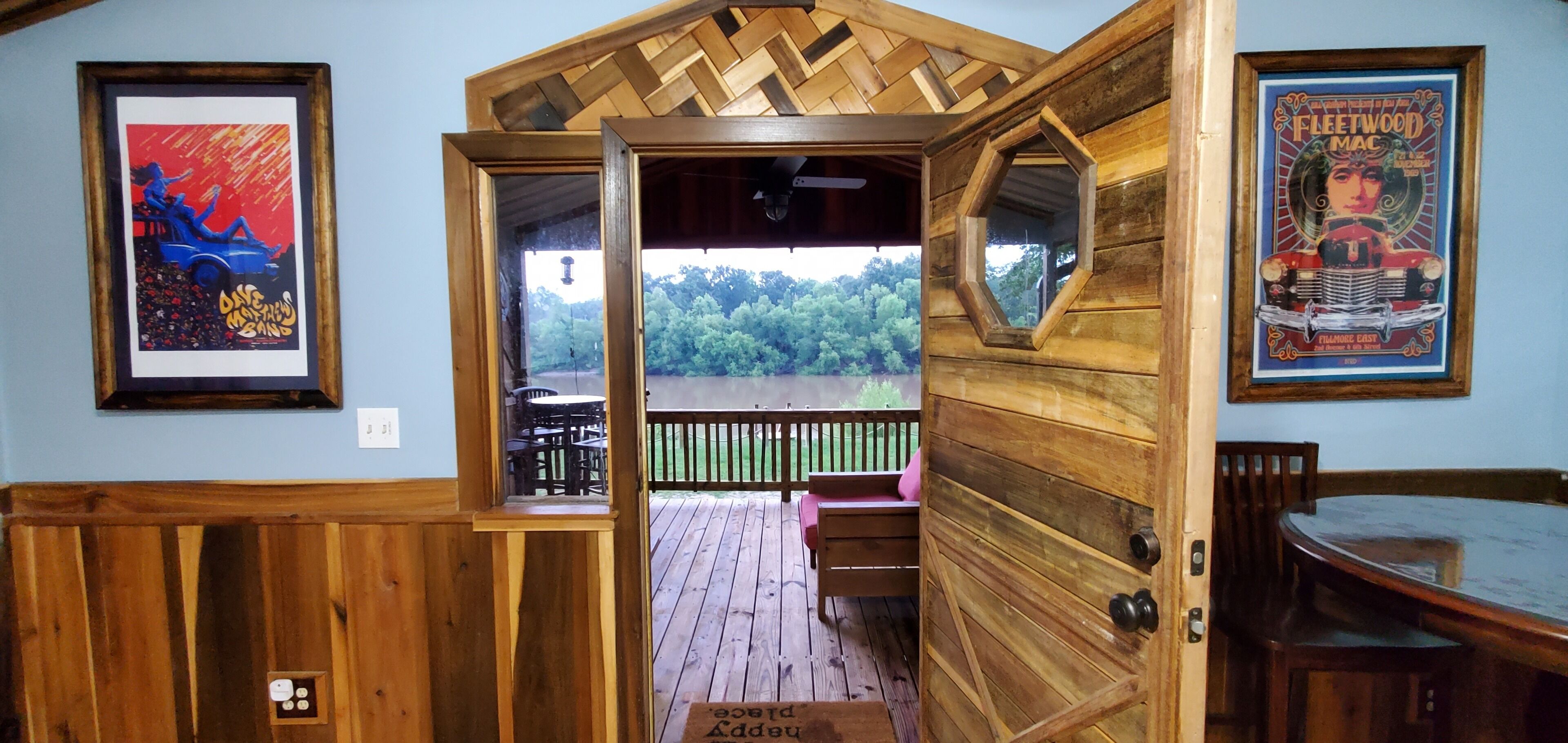 Step out from the living room and onto our delightful river view porch.
