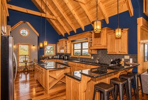 Fully furnished kitchen with granite, timber ceilings and breakfast bar - Splashing at the Bluff: Indoor Pool, Theater, Arcade, Hot Tub, Sleeps 22 (Sevier County)