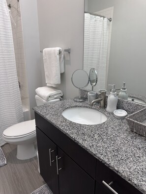 Hair dryer, towels, soap, shampoo