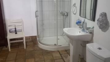 Shower, towels, soap, shampoo