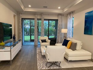 Living area - Welcome to this brand new exquisitely furnished Vila with a community pool & spa (Naples)
