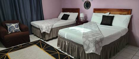 Basic Quadruple Room | In-room safe, laptop workspace, blackout curtains