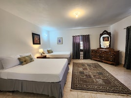 Basic Quadruple Room | In-room safe, laptop workspace, blackout drapes