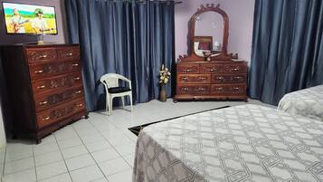 Basic Quadruple Room | 1 bedroom, in-room safe, blackout curtains, iron/ironing board