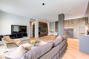Premium Apartment | Living area | 40-inch flat-screen TV with digital channels