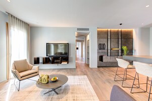 Premium Apartment | Living area | 40-inch flat-screen TV with digital channels