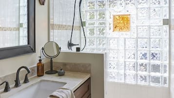 Shower, eco-friendly toiletries, hair dryer, towels