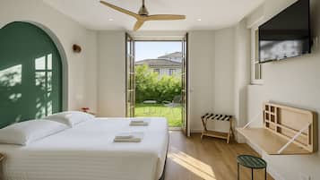 Double Room, Terrace, Ground Floor | Blackout curtains, iron/ironing board, free WiFi, bed sheets