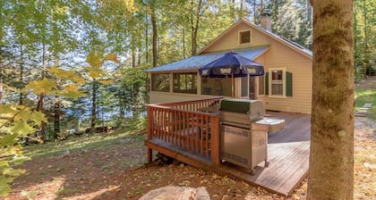 Charming Camp with an upstairs loft and wrap around deck. Near the Lake!
