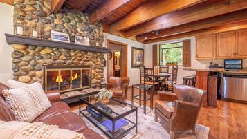 Smart TV, fireplace, books, stereo