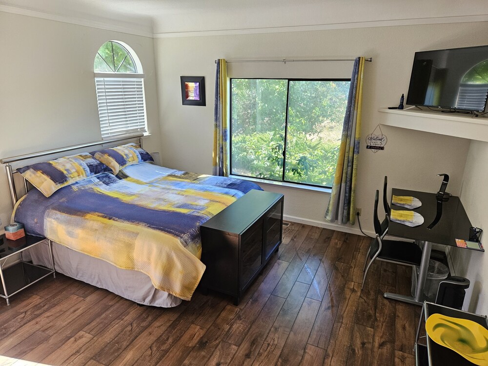 Luxurious 1 bedroom suite with private fenced patio. Pet Friendly