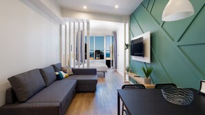 Estudio superior | Área de sala de estar | Televisión de pantalla plana, Netflix y servicios de streaming