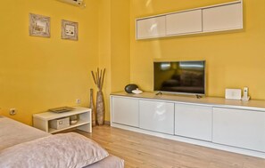 1 habitación, tabla de planchar con plancha, wifi gratis y ropa de cama 