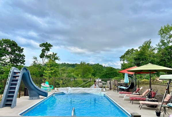 Outdoor pool, a heated pool - Peaceful family & pet-friendly country 3-bedroom house. Fire pit and views! (Harding)