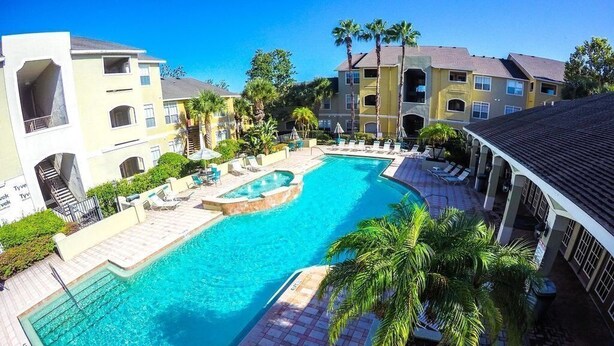 A swimming pool with lounge chairs and palm trees, surrounded by multi-story buildings. - 1st Floor Condo,  $85 OctNovDec. Sleeps 4. renovated.
The Avalon at Clearwater

 (Clearwater)
