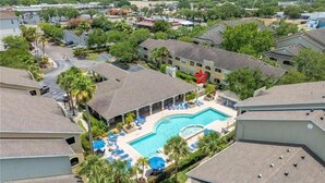 A residential area with a swimming pool surrounded by lounge chairs and palm trees. - 1st Floor Condo,  $85 OctNovDec. Sleeps 4. renovated.
The Avalon at Clearwater

 (Clearwater)