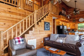 Smart TV, chimenea, mesa de ping pong, libros