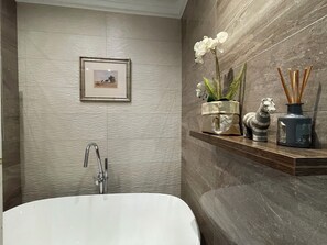 Hair dryer, towels, soap, toilet paper