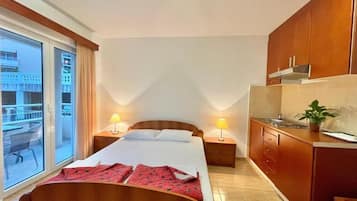 Kamar Triple Klasik | Seprai premium, meja kerja, kedap suara, dan Wi-Fi gratis